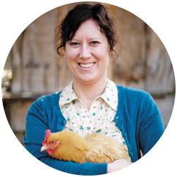 Kendra Feather holding a chicken